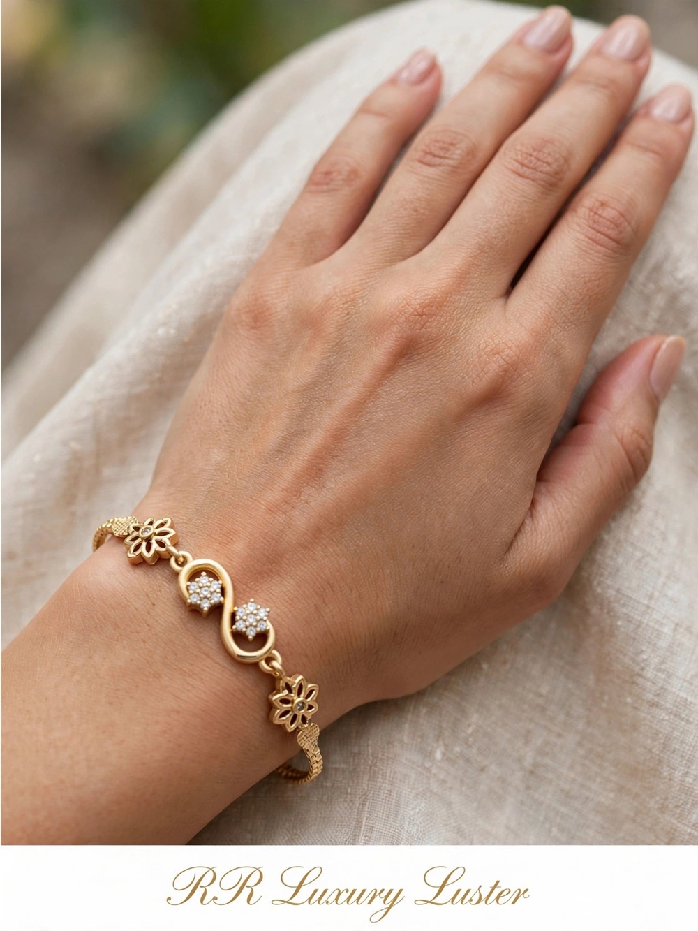 Gold Floral Infinity Bracelet with Sparkling Accents